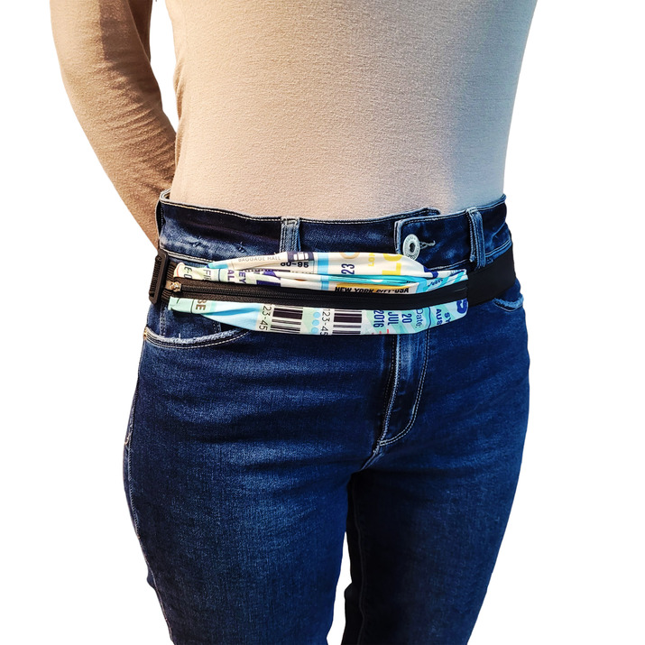 RIÑONERA ULTRADELGADA - HISTORIA